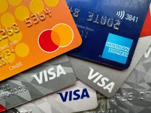 CASH AND CREDIT CARDS MERITS AND DEMERITS