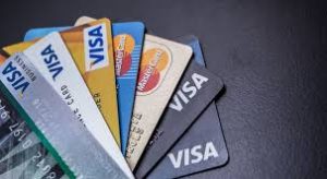 CASH AND CREDIT CARDS MERITS AND DEMERITS